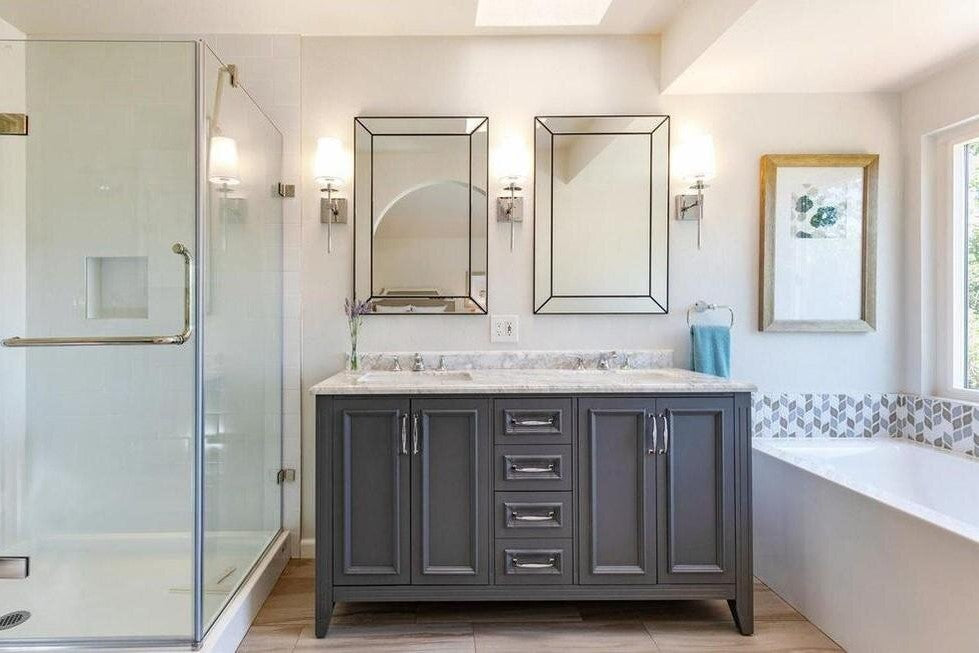 http://widecanvas.design/cdn/shop/articles/Remodeled_Bathroom_with_Gray_Freestanding_Vanity_Double_Sink_Marble_Countertop_Leaf_Mosaic_Tile_on_Tub.jpg?v=1593731881