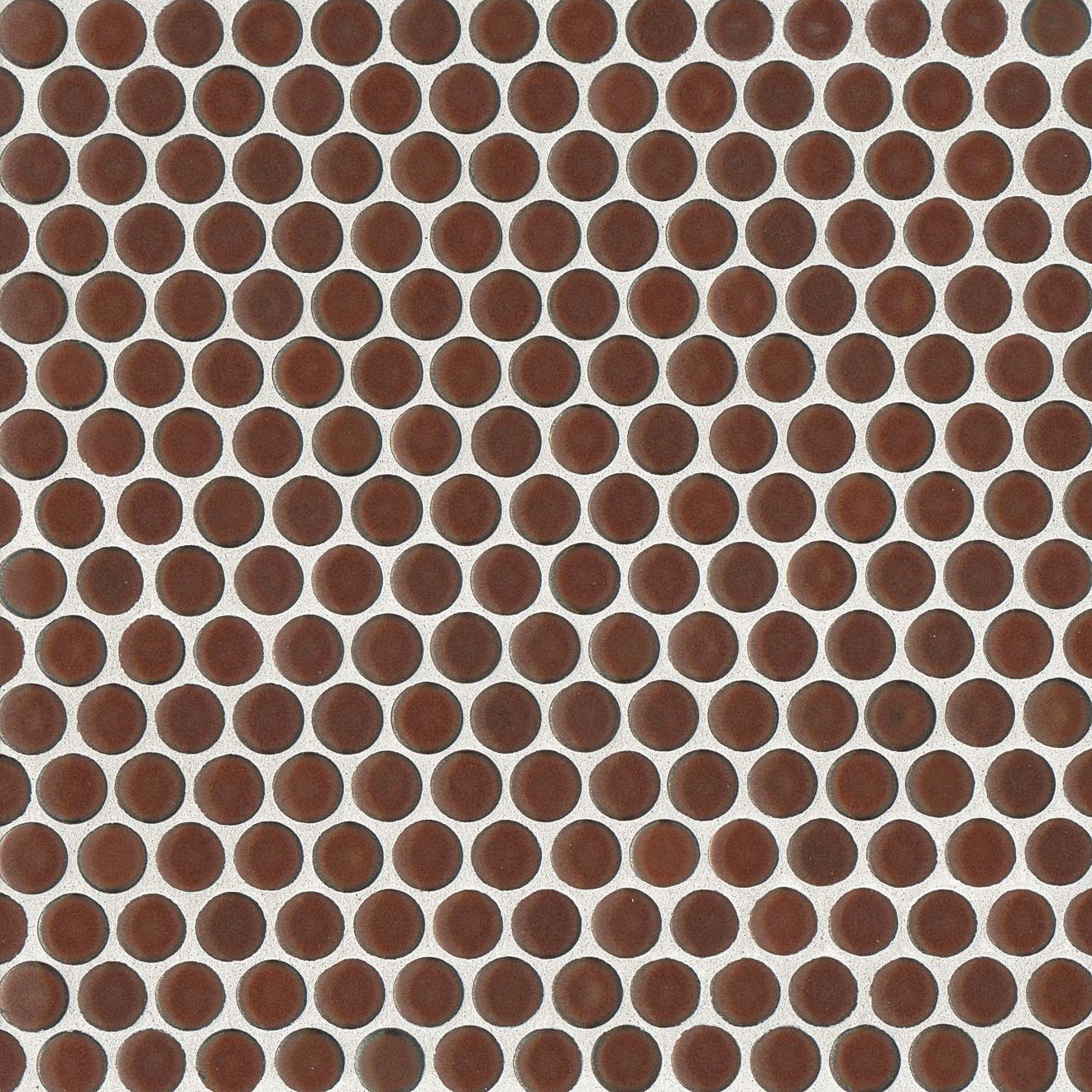 Cardinal red penny shaped mosaic tile on a beige background.