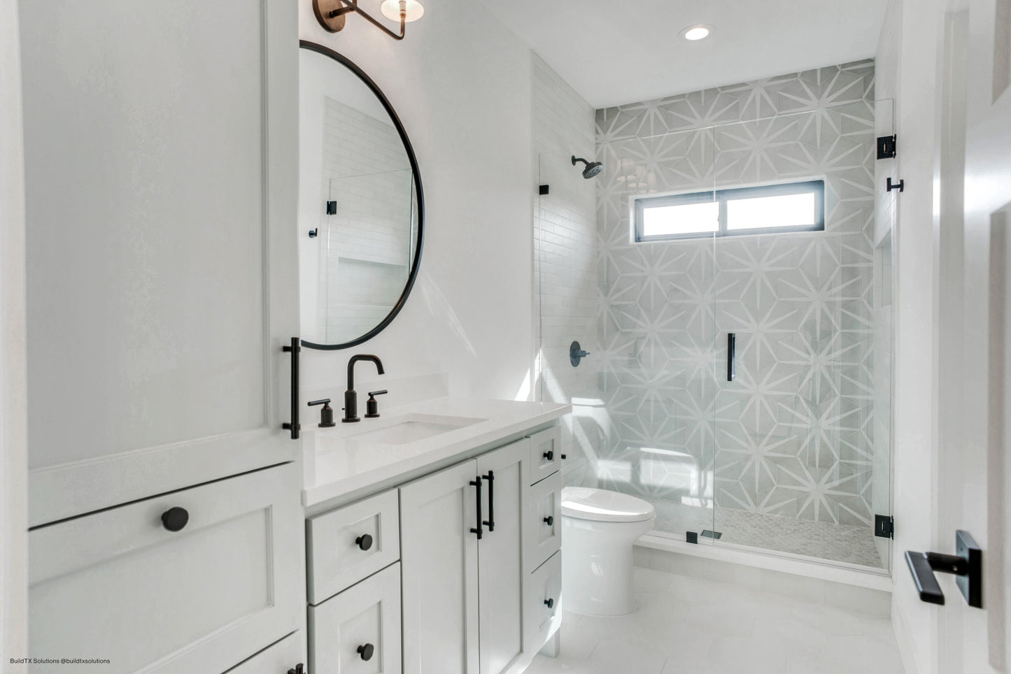 Stella decorative tile used as an accent wall in modern, minimalistic shower. and bathroom combo.