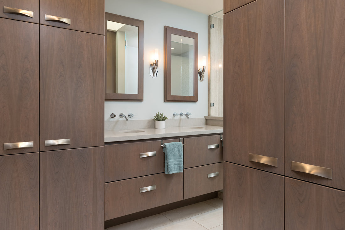 After photo of remodeled master bathroom with built in wardrobes and double vanity