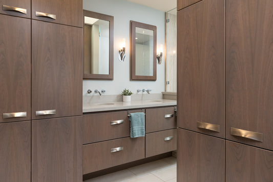 After photo of remodeled master bathroom with built in wardrobes and double vanity