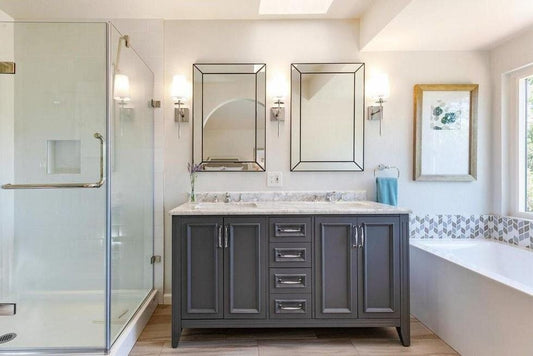Remodeled+Bathroom+with+Gray+Freestanding+Vanity+Double+Sink+Marble+Countertop+Leaf+Mosaic+Tile+on+Tub
