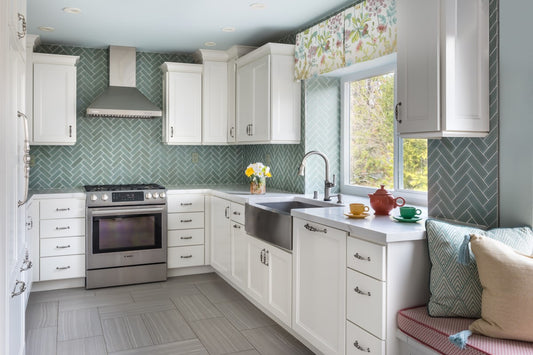 Remodeled Kitchen with Brigth Colors, Fiestaware, herringbone blue-green backsplash, window seat