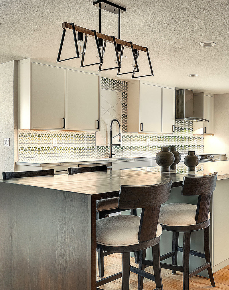Modern kitchen with woode waterfall  island, stools, and hand-painted decorative backsplash