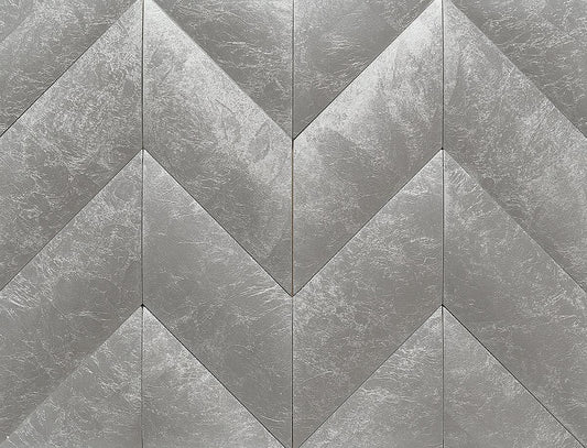 10.5" x 11 Metallic silver natural stone tile in a herringbone pattern.