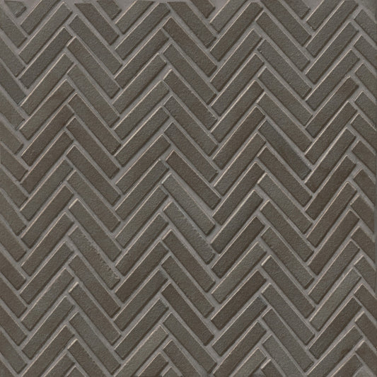 Herringbone tile in the color Metallic on a neutral background. 