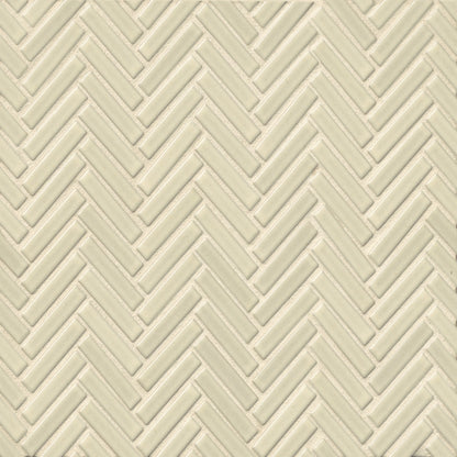 Herringbone tile in the color Off White on a neutral background. 