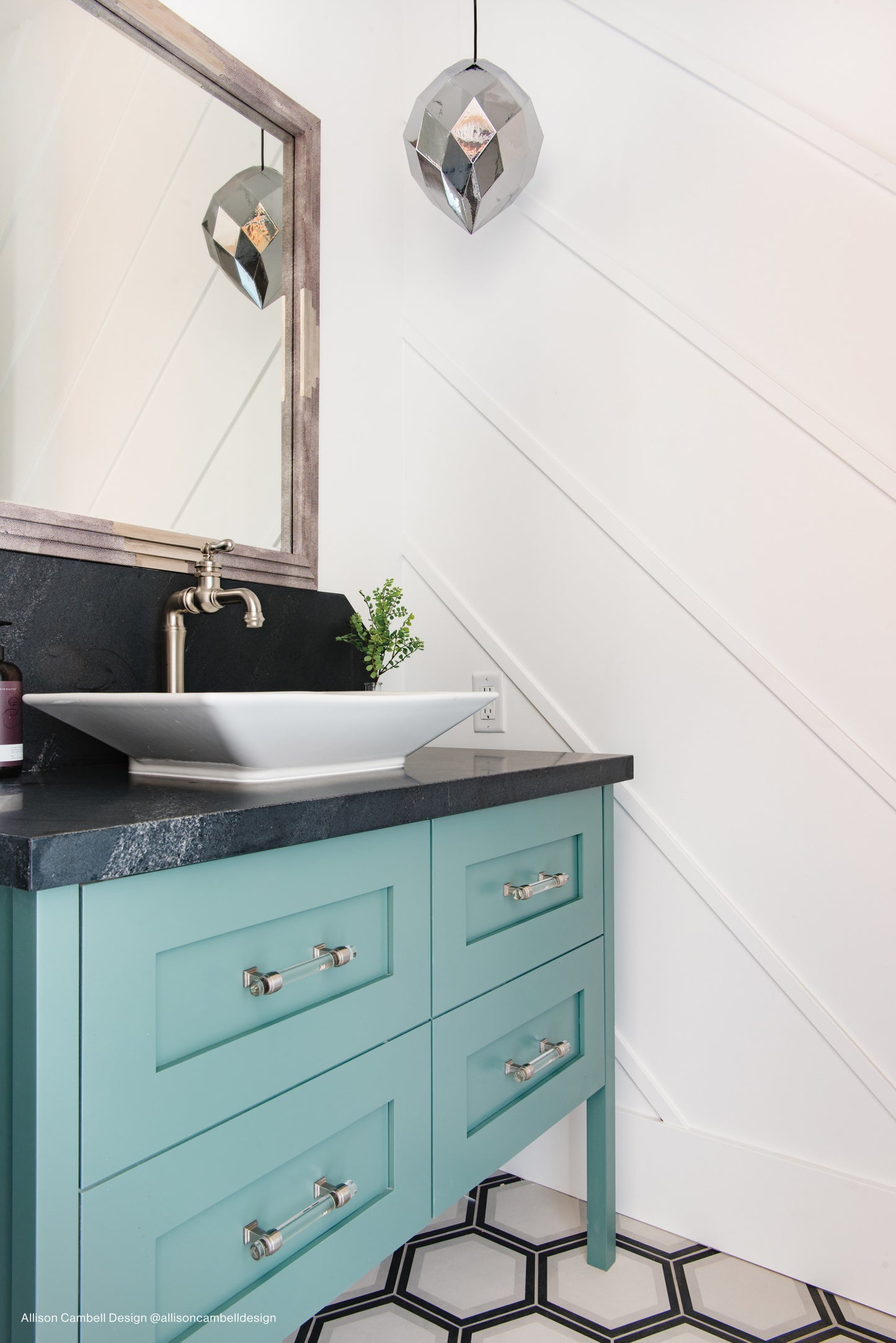 Example of Teliano hexagon decorative tile in a bold, modern bathroom with a teal vanity. 